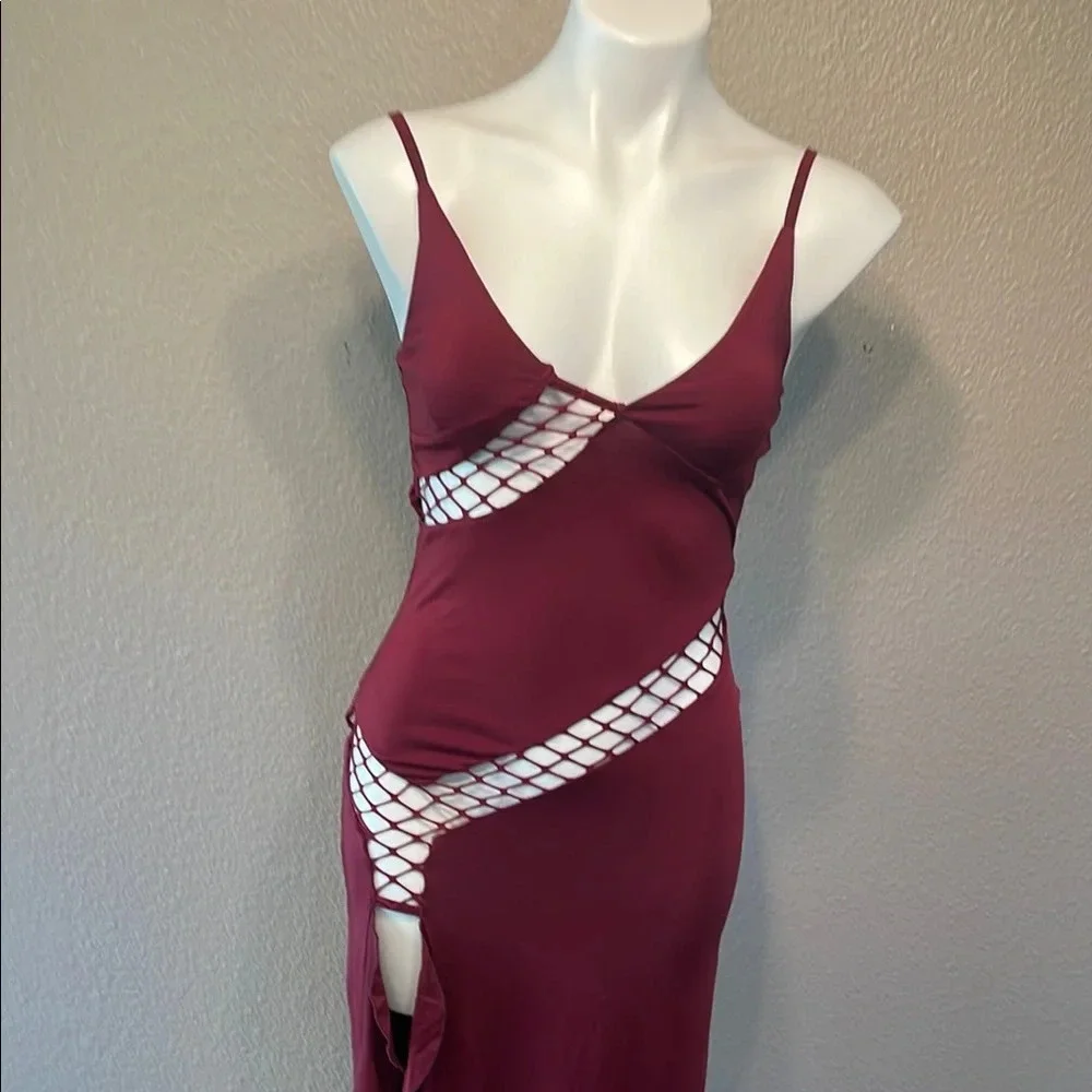 Elegant Asymmetrical Burgundy Dress with Chic Open Areas - Picture 7 of 9